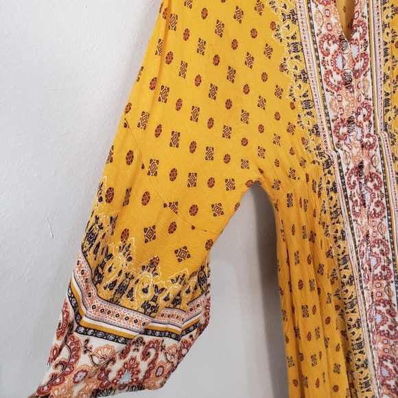 Coco+Jaimeson Large Boho Style Dress with Bell Sleeves and a Handkerchief Hem - Picture 4 of 6